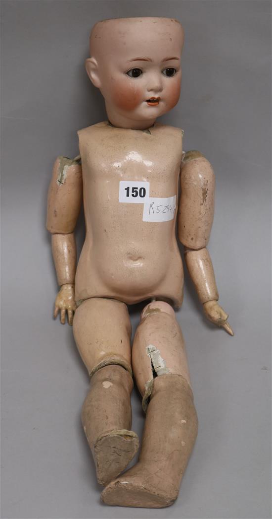 A Heubach and Koppelsdorf 320-3 bisque head doll
